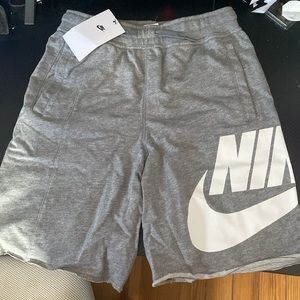 Gray Nike shorts. Flexible, warm material.